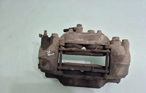 Mitsubishi Pajero Front brake caliper 