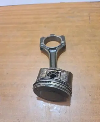 Piston with connecting rod