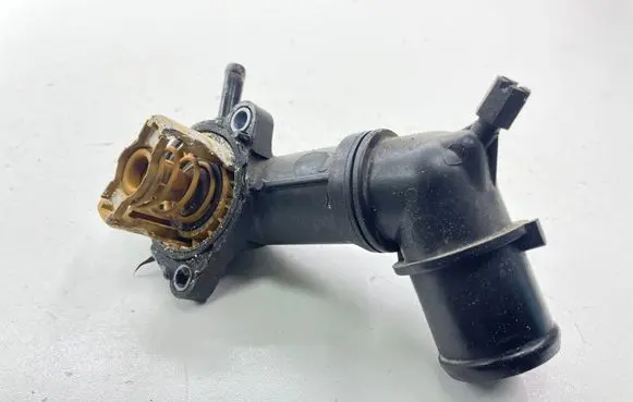Thermostat/thermostat housing