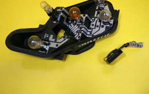 Opel Corsa D Tail light bulb cover holder 89037877A