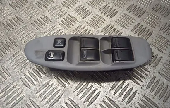 Nissan Almera Tino Front door window switch trim 