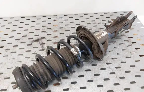 Front shock absorber with coil spring