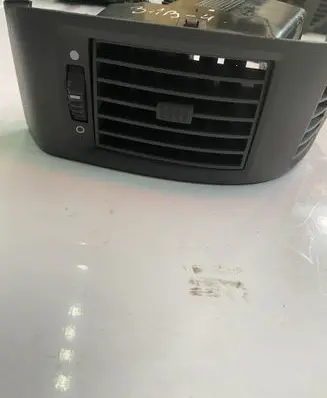 Dash center air vent grill