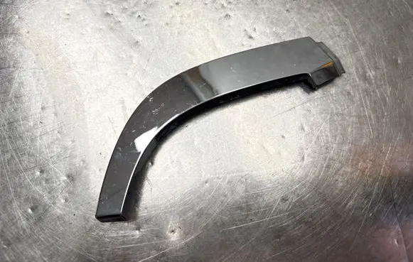 Saab 9-5 Under headlight/headlamp trim 89101444