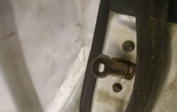 Mazda 6 Rear door check strap stopper