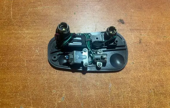Mitsubishi Lancer Tail light bulb cover holder