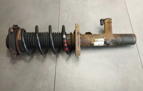Volkswagen Scirocco Front shock absorber with coil spring 1T0413031HC E4604601 31027598