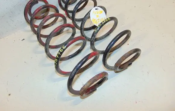 Ford Fusion Rear coil spring 1329627 2N115560AE