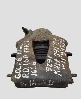 Volkswagen Golf VI Front brake caliper