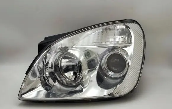 KIA Carens III Headlight/headlamp 92101-1DO