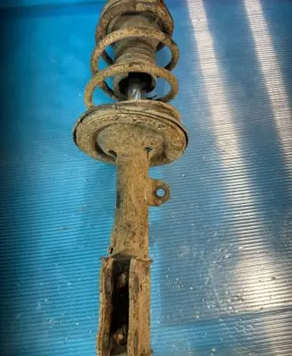 Toyota Corolla E120 E130 Front shock absorber with coil spring