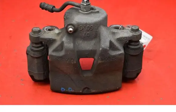 Hyundai Tucson JM Front brake caliper