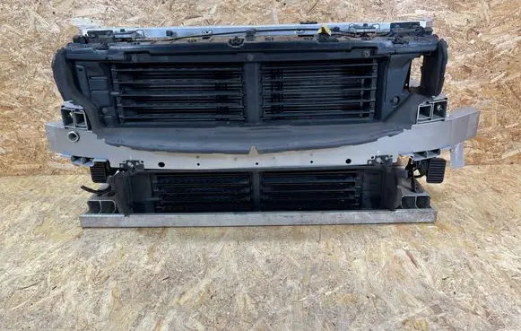 Radiator support slam panel