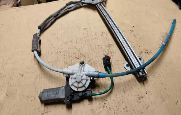 Jeep Cherokee XJ Front door window regulator with motor 55154963