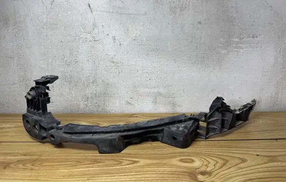 Volkswagen Golf VI Headlight/headlamp mounting bracket 1K9607571