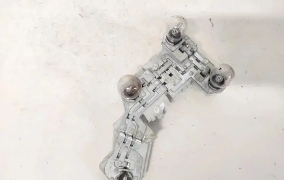 Volvo V50 Tail light bulb cover holder 28128007