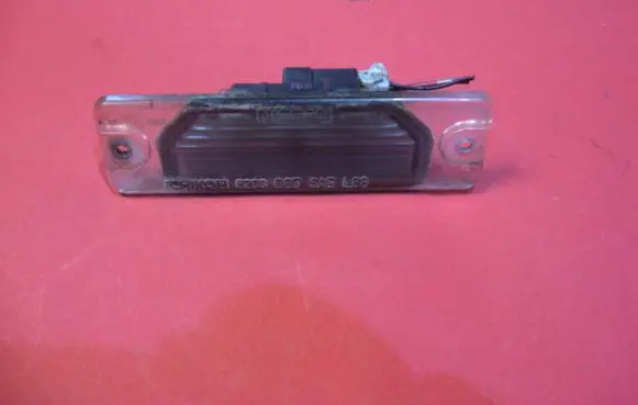 Nissan Almera Number plate light 6203 SAEL88