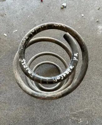 Chrysler Voyager Front coil spring 5006762AA