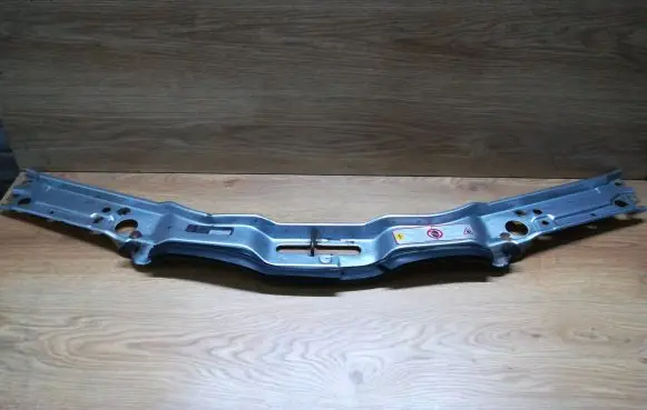Top upper radiator support slam panel