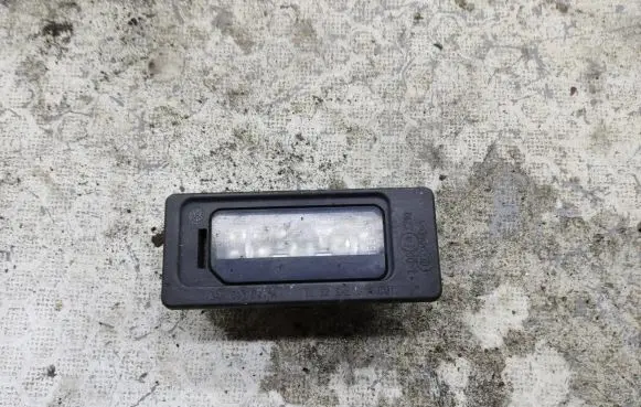 Volkswagen Golf Sportsvan Number plate light 3AF943021A