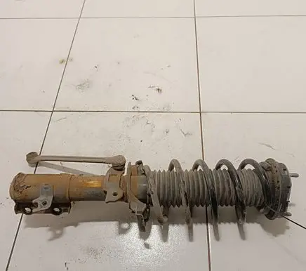 Ford Fiesta Front shock absorber with coil spring E46A6101 H1bC18K001BC