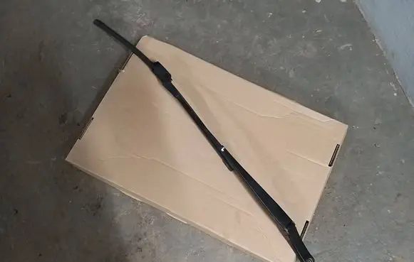 Volkswagen Touran II Front wiper blade arm 2K1955409B