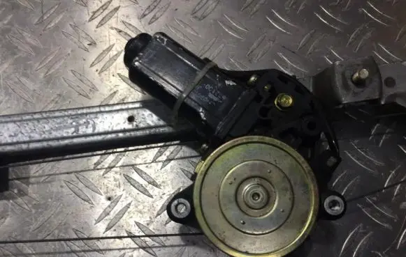 Front door window regulator motor