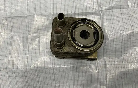 Jeep Cherokee Oil filter mounting bracket 05047370AC
