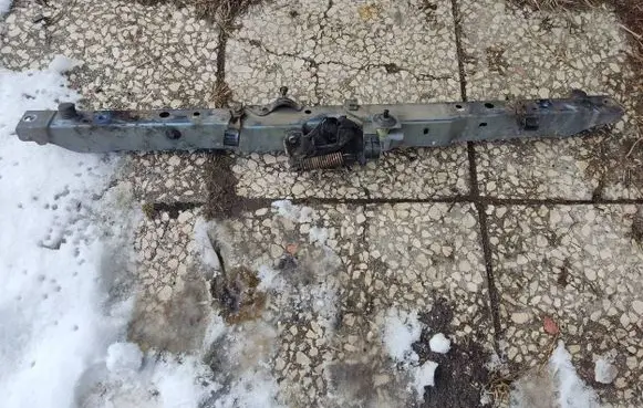 Radiator support slam panel