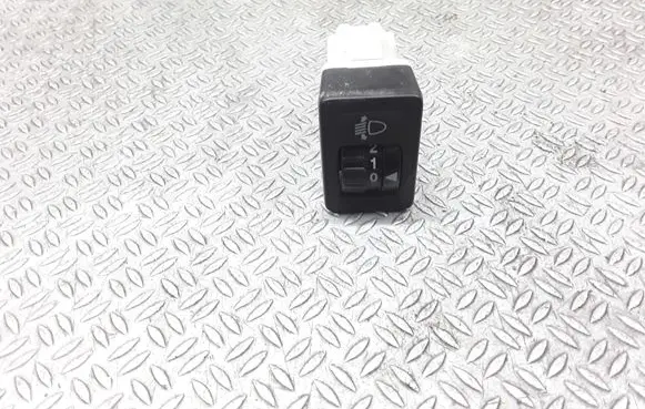 Suzuki Swift I Headlight level height control switch