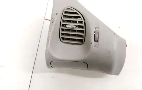 Nissan Almera Tino Dash center air vent grill 68210BU200 K10281