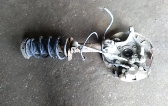 Volkswagen PASSAT B6 Front wheel hub spindle knuckle