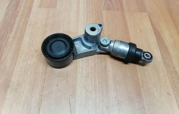 Renault Espace V (RFC) Generator/alternator belt tensioner F61211102 117501769R