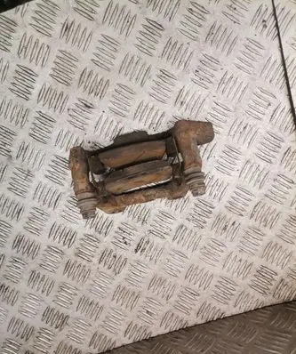 Volkswagen Touran I Brake caliper pad carrier rear 