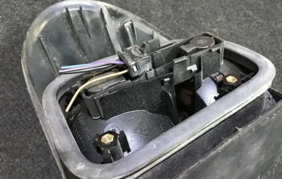 Renault Laguna I Tail light bulb cover holder