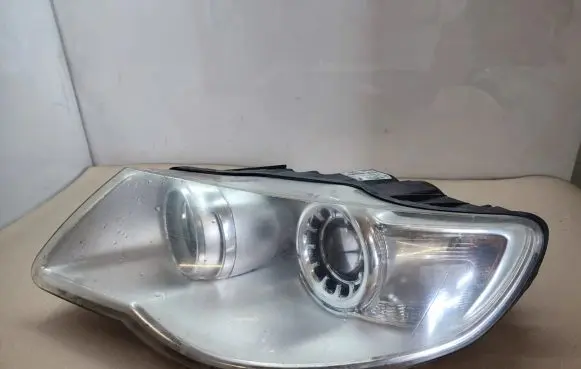 Volkswagen Touareg I Headlight/headlamp 7L6941031A