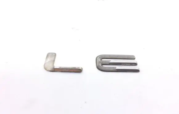 Chrysler Stratus Rear door emblem/model letters 