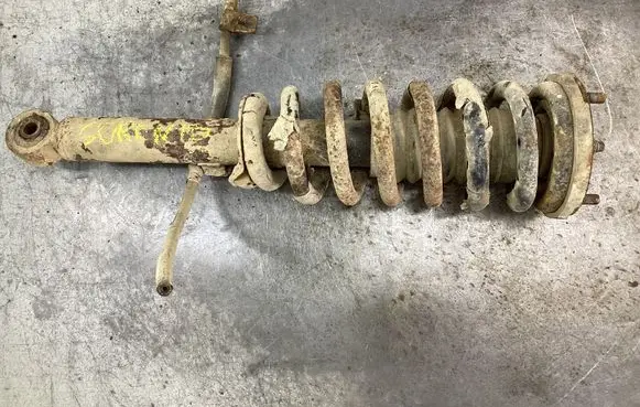Front shock absorber with coil spring