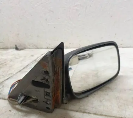 Volkswagen PASSAT B3 Front door electric wing mirror 357837990B