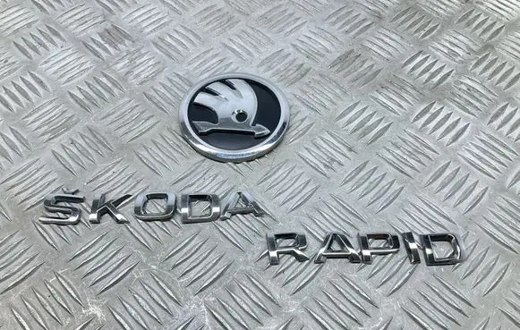 Skoda Rapid (NH) Manufacturers badge/model letters 5JA853621