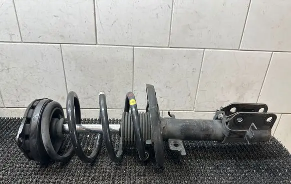 Renault Megane III Front shock absorber with coil spring 543020942R