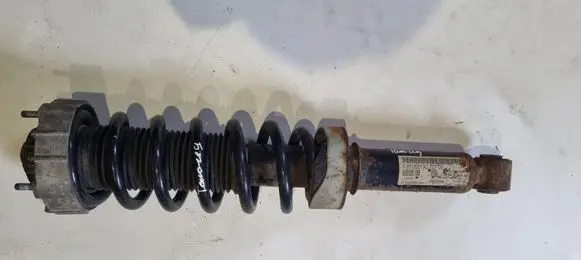 Volkswagen Touareg I Rear shock absorber with coil spring 7L6513029