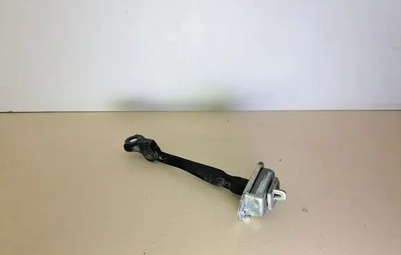 Nissan Pulsar Rear door check strap stopper