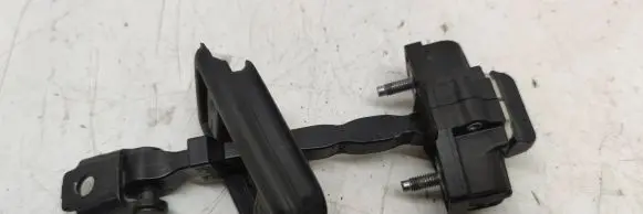 Front door check strap stopper