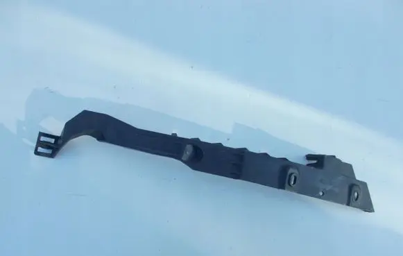 Opel Astra J Headlight/headlamp mounting bracket 13287640