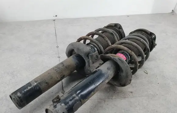 Volkswagen PASSAT B6 Front shock absorber/damper 335808
