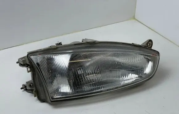 Mitsubishi Colt Headlight/headlamp 10087148