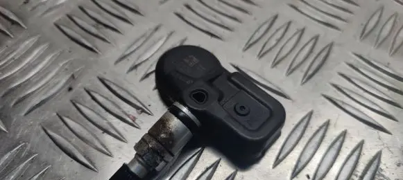 Nissan Juke I F15 Tire pressure sensor 407006WY0B