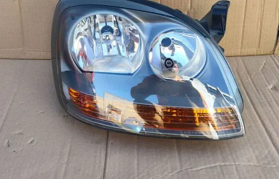 Nissan Almera Tino Headlight/headlamp 964324