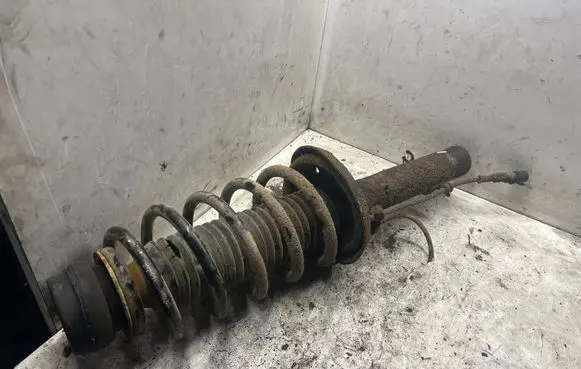 Volkswagen Golf IV Front shock absorber with coil spring